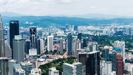 Fototapeta na wymiar Kuala Lumpur City skyscrapers rooftop urban view