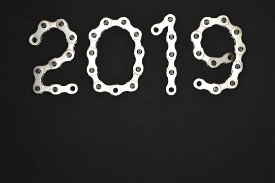 bike chain year 2019 upper section on dark background