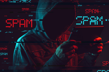 Electronic spamming concept with faceless hooded male person - obrazy, fototapety, plakaty