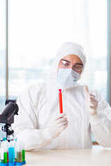 Fototapeta premium Male chemist working in lab