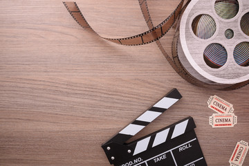 Equipment and elements of cinema on wood table top horizontal