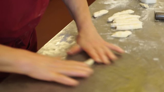 Close up, rolled dough on counter