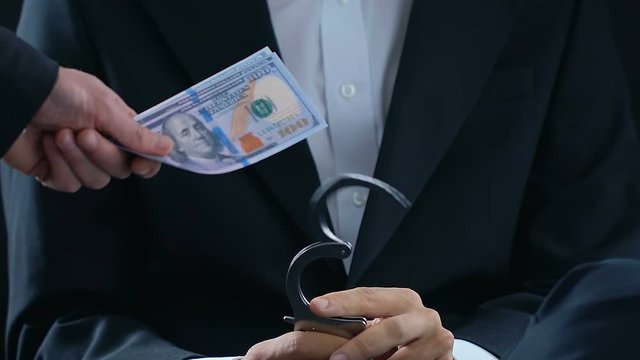 Man from tax service refusing to take bribe, threatens to arrest, conscience