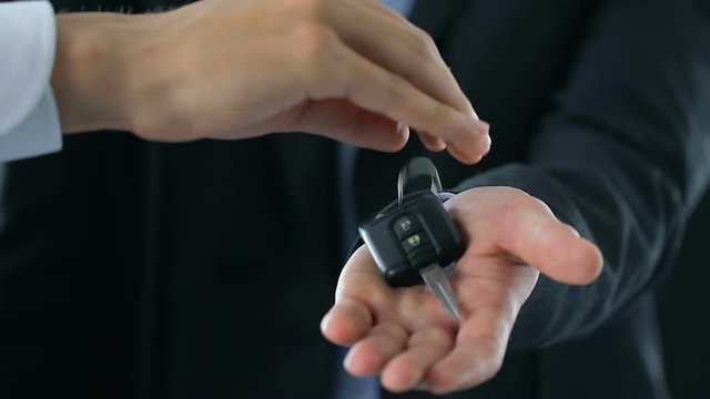 Judicial executor confiscating officials car for non-payment of taxes, justice