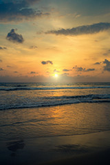 Fototapeta na wymiar Sunset on the shores of the Indian Ocean, Bentota, Sri Lanka
