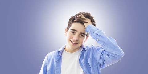 portrait of teenager on the blue background
