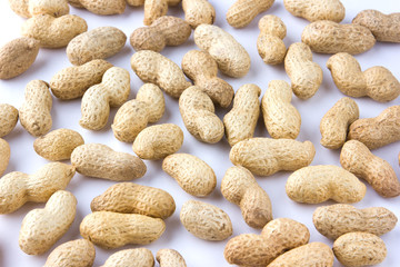 Fried peanuts in shell. Peanut in shell on white background.