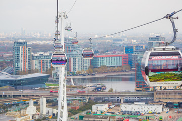 The one kilometre, 0.63 mile, long cable car link travels 90 metres, above the River Thames from...