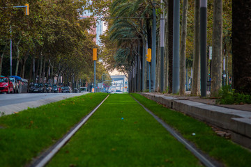 Barcelona railway with green grass background. Eco transportation. © Aerial Film Studio