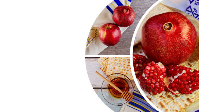 Pomegranate, apple and honey, traditional food of jewish New Year celebration, Rosh Hashana. Shofar and tallit Copyspace background