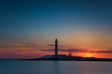 Il faro di Punta Sottile al tramonto, isola di Favignana IT