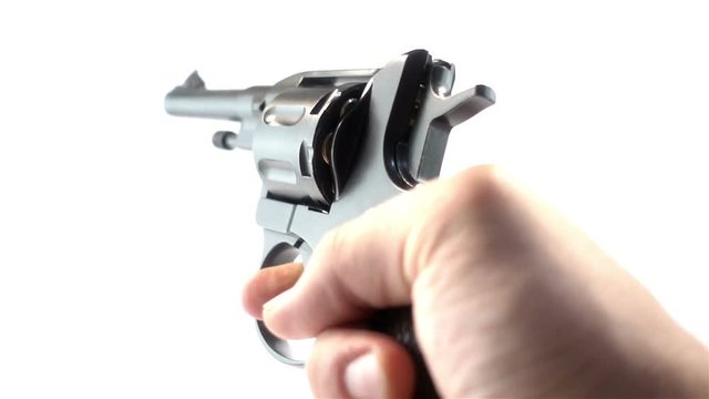 Man Shooting a Revolver on White Background in Super Slow Motion 1000 fps