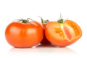 Two red tomato and one half isolated on white background.