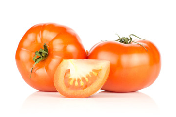 Two red tomatoes and one slice isolated on white background fresh.