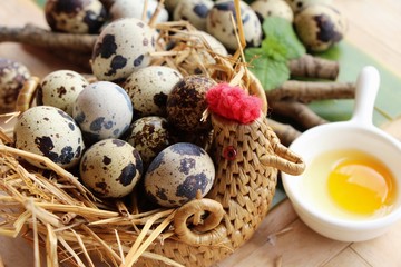 Quail eggs is delicious on wood background