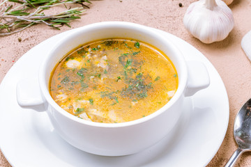 Chicken soup bouillon in a plate