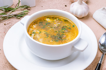 Chicken soup bouillon in a plate