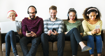 Group of people enjoying music streaming