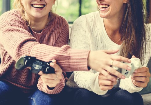 Women Playing Video Game Together