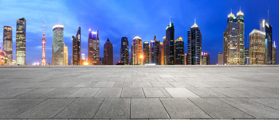 empty square floor and city skyline scene in shanghai at night