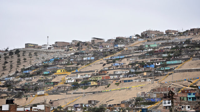 Hillside slum buildings on the outskirts of Lima, Peru