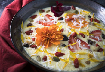 Close up view of flower in a smoothie bowl