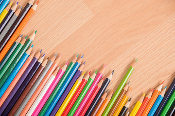 Fototapeta premium many color pencil on wood background