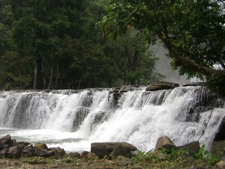 Close up of the second tier of the Tinuy-an Falls cascading into the river. Tinuy-an Falls is popularly known as as the Niagara Falls of the Philippines in Surigao del Sur, Philippines