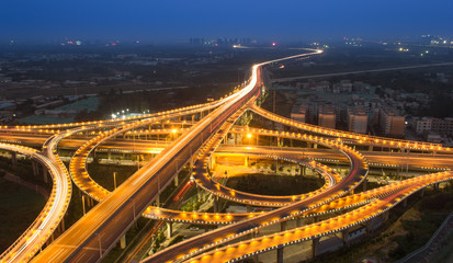 night view of the viaduct in a busy city in China 