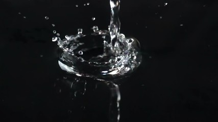 Water Spalsh Crown in Super Slow Motion on black background