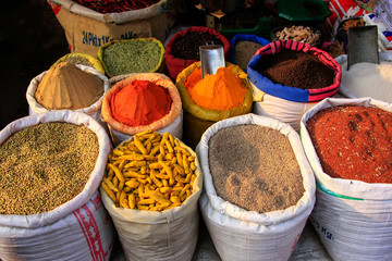 Display of grain and spices at the street market in Fatehpur Sikri, India