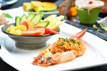 Big river shrimp with salad on white plate