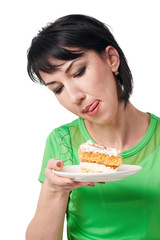 girl posing with sweet cake and lick her lips, isolate on white background