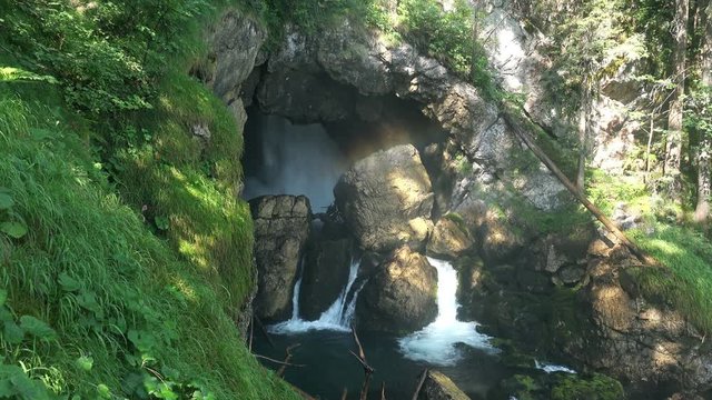 Amazing Nature Ladscape of Cascade Waterfall with Rainbow. 4K Ultra HD