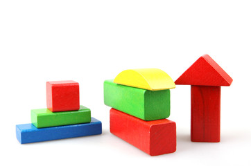 Wooden building blocks isolated on white background