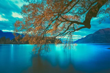 Fotobehang Turquoise Zonsondergang bij Lake Wakatipu, landschap van Queenstown, Nieuw-Zeeland