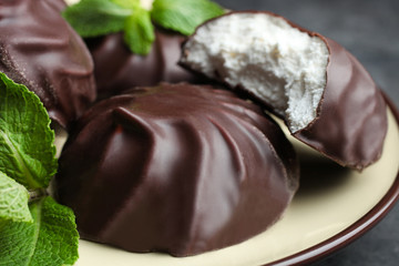 marshmallow in chocolate and a mint