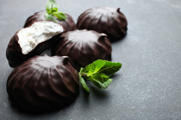 marshmallow in chocolate and a mint