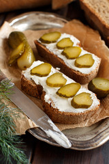 Sandwiches with cream cheese and salted cucumber