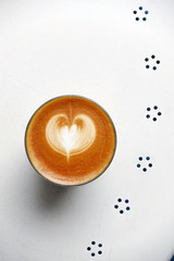 a cup of latte art coffee for background