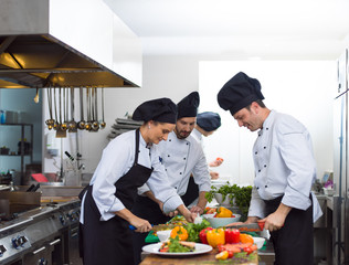 Fototapeta na wymiar team cooks and chefs preparing meals