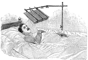 Schwebepult zum Lesen: Mann liegt im Bett und liest