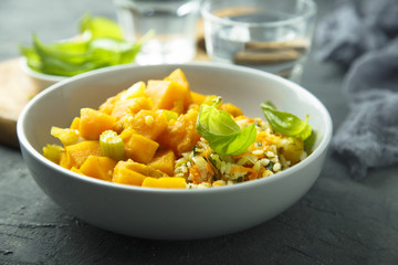 Pumpkin stew with rice and fresh basil