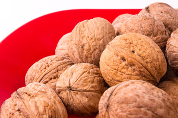 walnuts in red plate