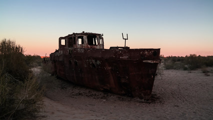 Obraz premium Panorama of ship cemetery at sunset near Moynaq, Karakalpakstan, Uzbekistan