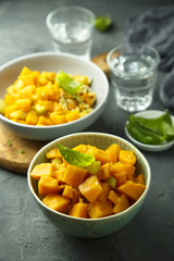 Pumpkin stew with rice and fresh basil