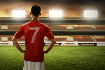 Soccer player standing on the field