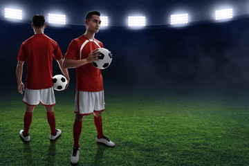 Fototapeta premium Soccer players on the field