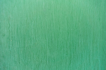 Green background with spills and ink stains.