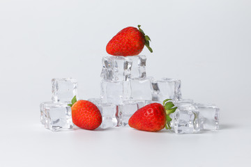 Strawberry blueberry berry read black ice cube on white background